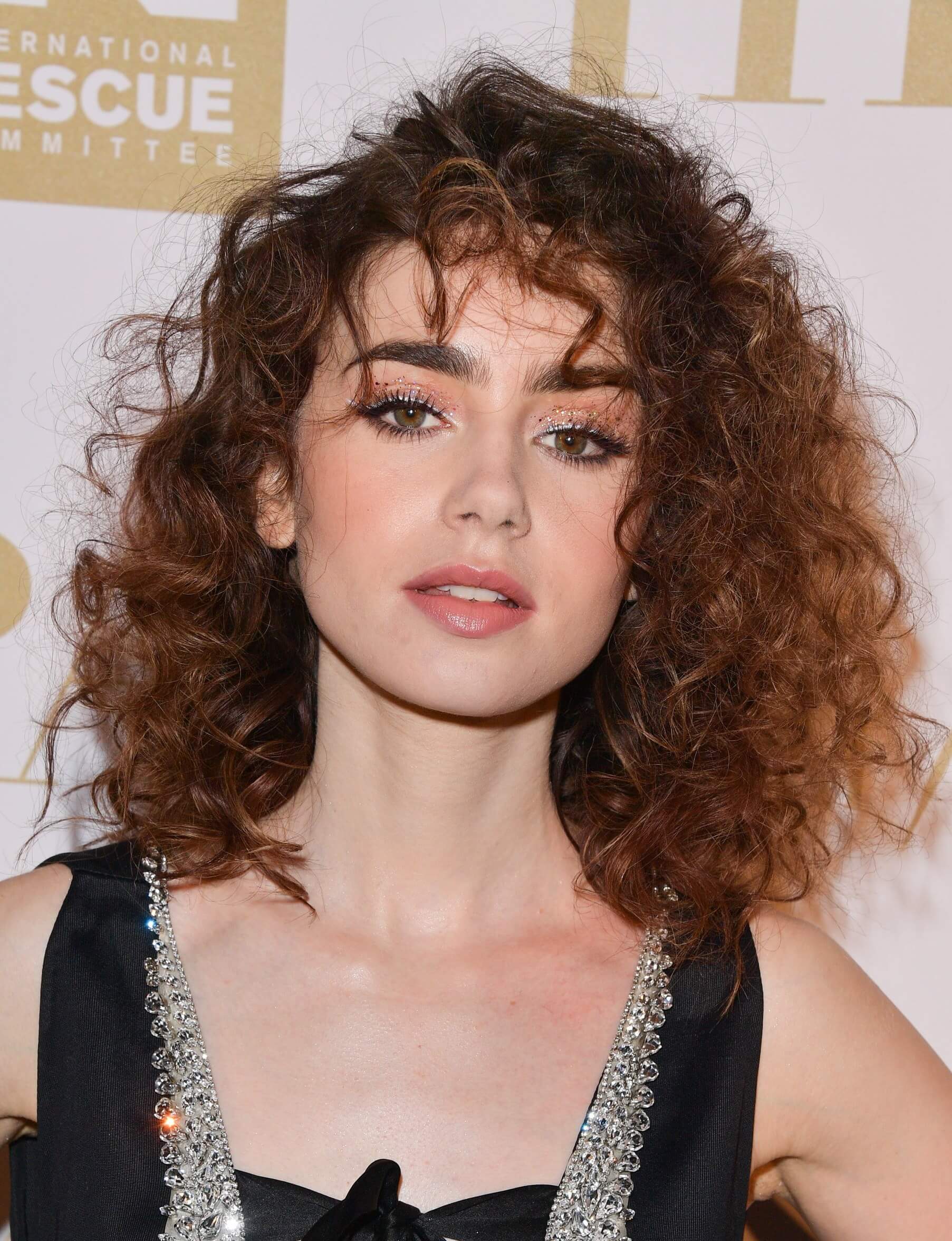 flaunt your curls with these 20 curly hairstyles with bangs