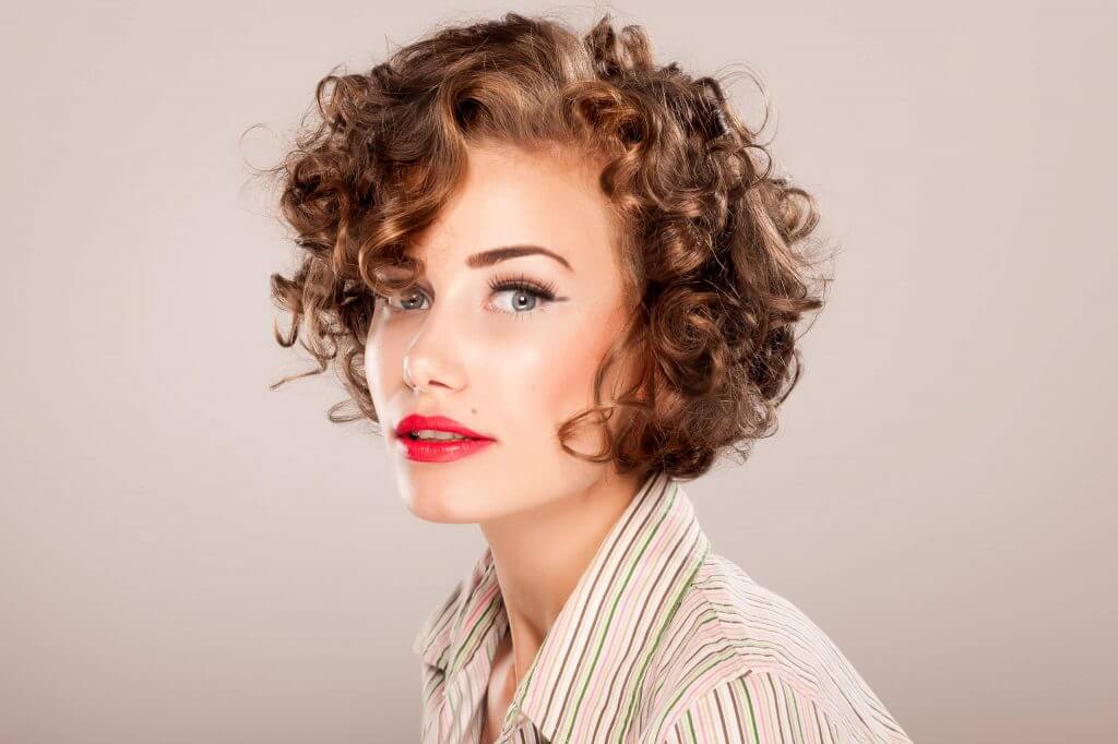 5. Short Curly Haircut for Round Faces - wide 3