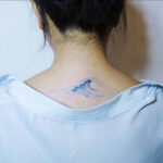 Colorful Upper Back Waves Tattoo