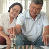 Older men and women happily save money.