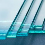 Sheets of Factory manufacturing tempered clear float glass panels cut to size